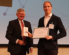 Prof. Dr. Andreas Hochhaus and Dr. Leo Rasche at the 2022 DGHO Annual Meeting